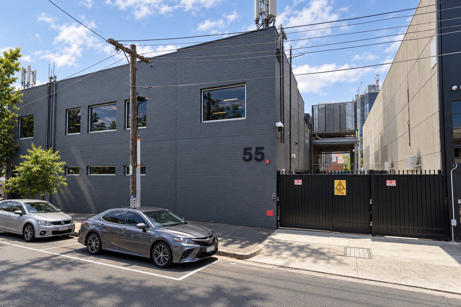 Epsilon Data Centre exterior at 55 Crockford Street, with its grey brick facade and gated entrance