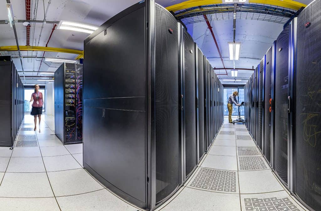 Rows of equipment racks inside MDC - Melbourne Data Center
